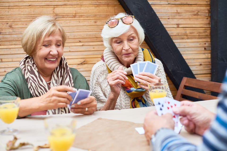 Older women playing cards